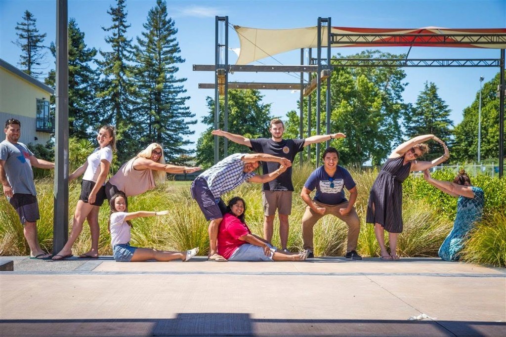 Vector Group team spelling VECTOR with their bodies — Te Puke